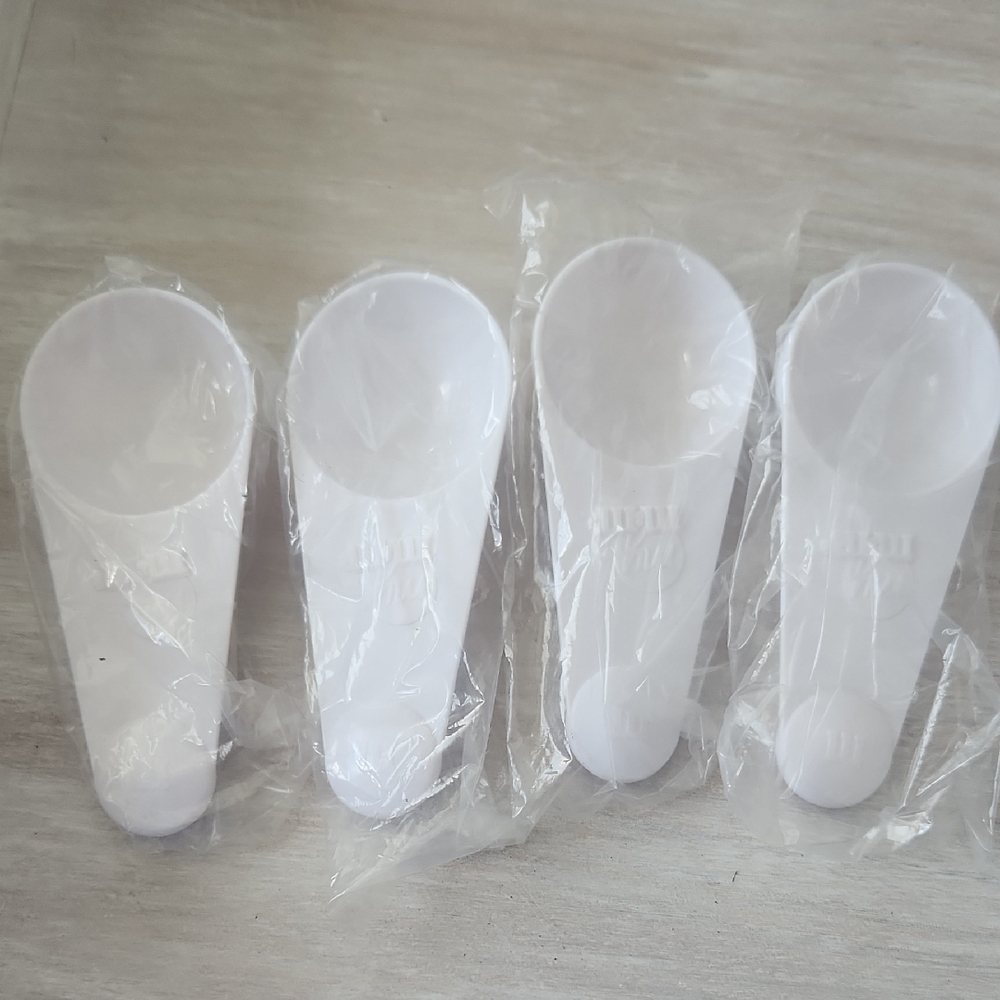 White Plastic Measuring Scoops for Parties